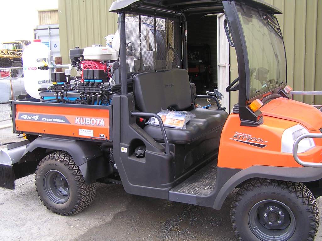 Kubota diesel 4X4 with 400 litre Quik corp ATV unit chemical dosing unit, rear covered boom and spot spray gun and side spray gun