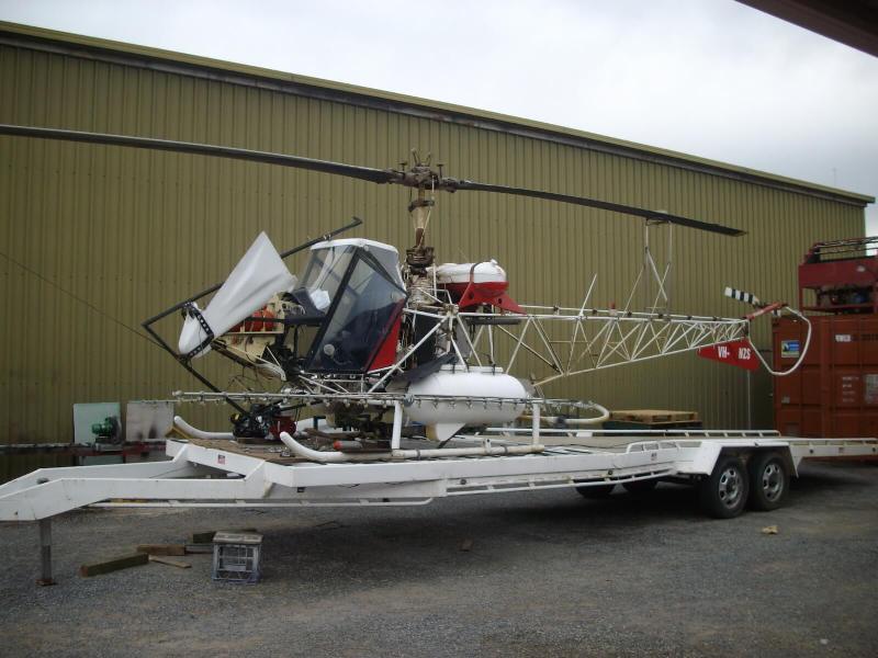 Chemical application kit added to helicopter for spraying of vegetables.